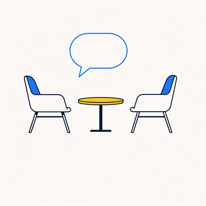 Deux fauteuils face à face autour d'une table basse, avec une bulle de dialogue.